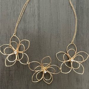 Charming Charlie 3-flower yellow gold color necklace